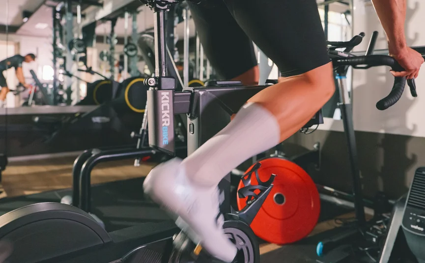 Person exercising on a KICKR Smart Bike indoors