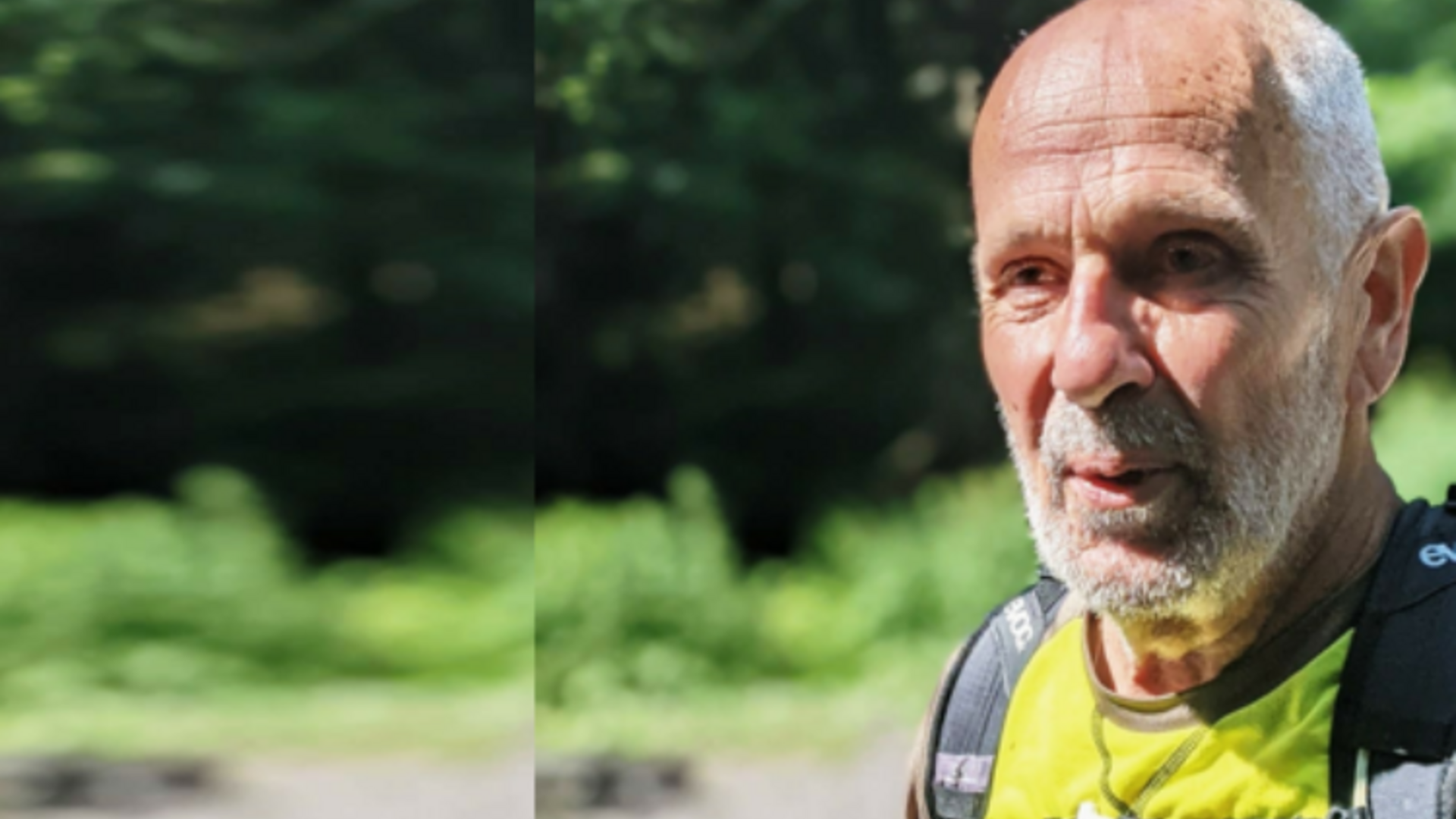 Älterer Mann mit Bart und Rucksack im Freien bei Sonnenschein