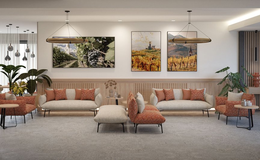 Garni Hotel Cornelian **** © Garni Hotel Cornelian Modern gestalteter Lounge-Bereich mit Sofas, Sesseln und Wandbildern