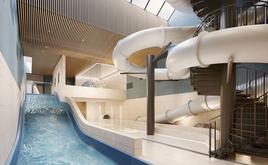 Modern indoor water park with slides and spiral staircase