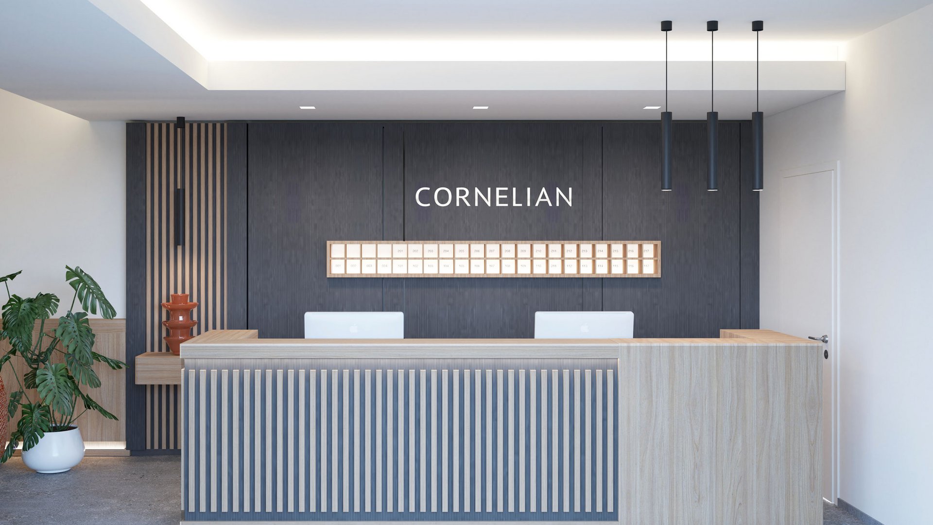 Moderner Empfangsbereich mit Schreibtisch und Pflanzen