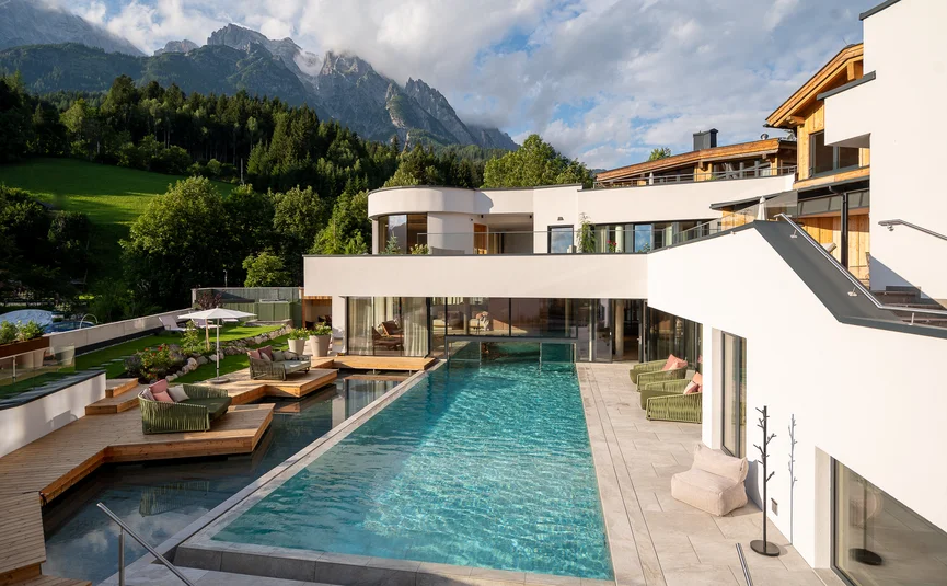 Modern pool and terrace at luxury house with mountain view