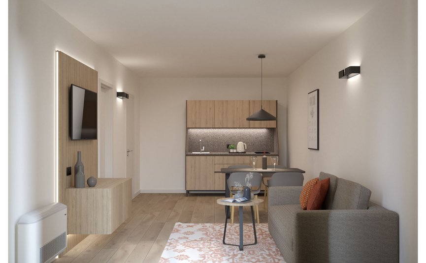 Garni Hotel Cornelian **** © Garni Hotel Cornelian Moderne kleine Wohnung mit Sofa, Teppich und Küchenzeile