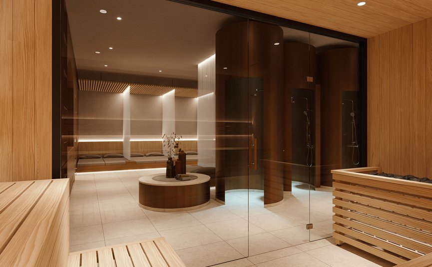 Modern wellness area with sauna, shower cabins, and wooden seating